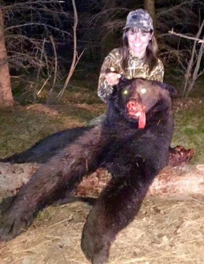 Myrna Budke shot this 260lb, black bear in the Northerns woods of MN with her 30-06 rifle